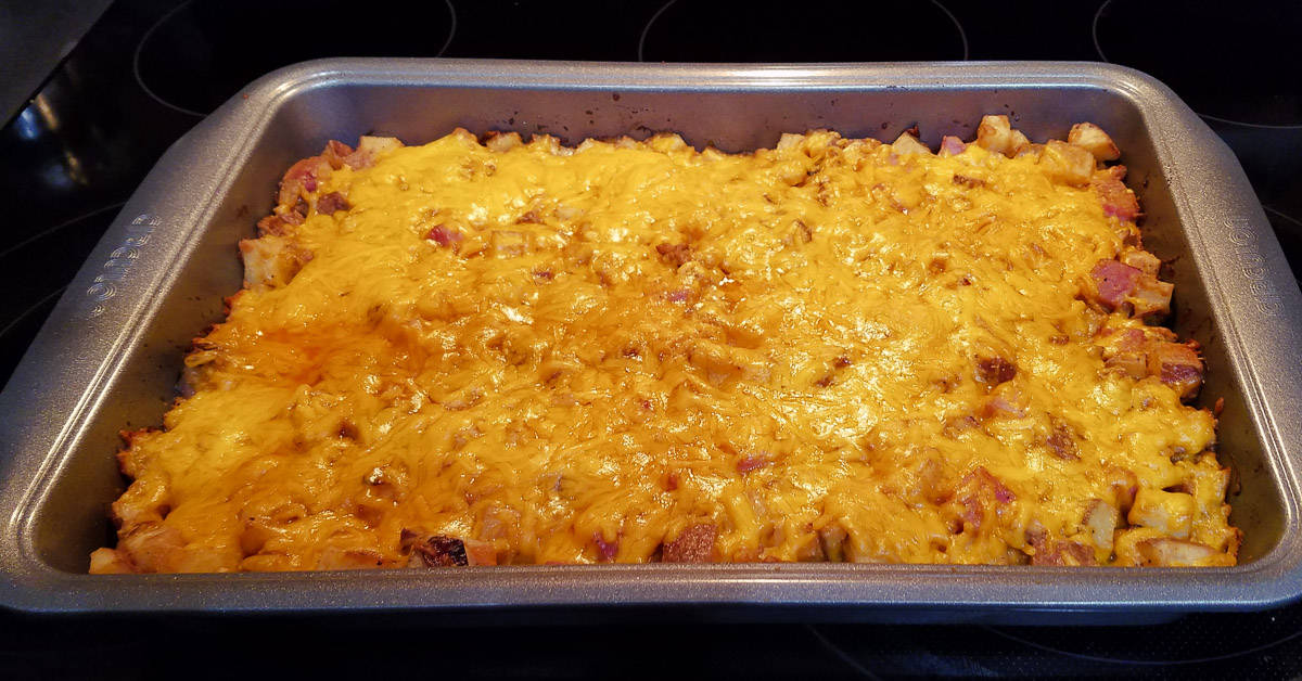 Savory Ham and Potato Casserole finished casserole with extra cheese on top