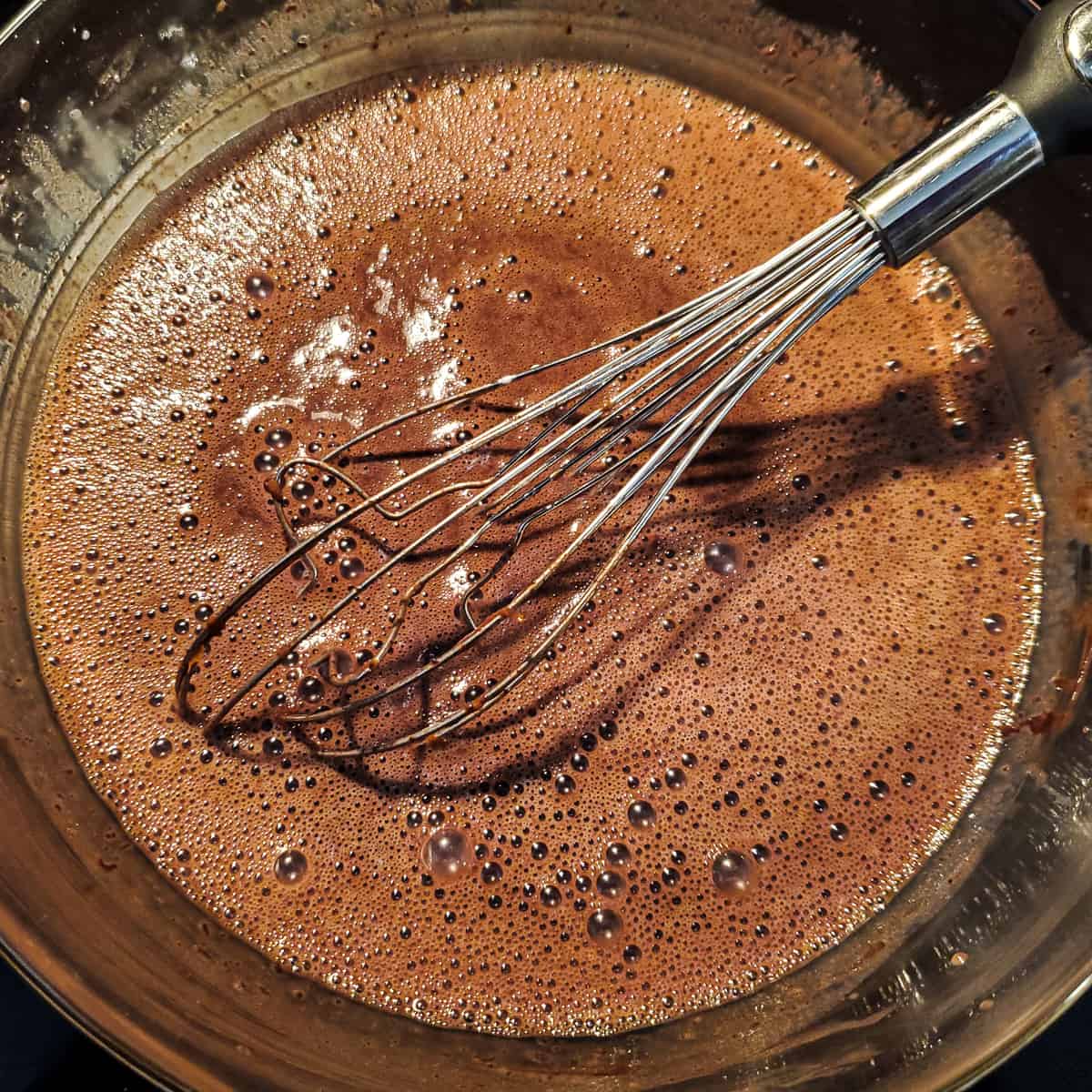 Chocolate custard mixing chocolate amd other ingredients